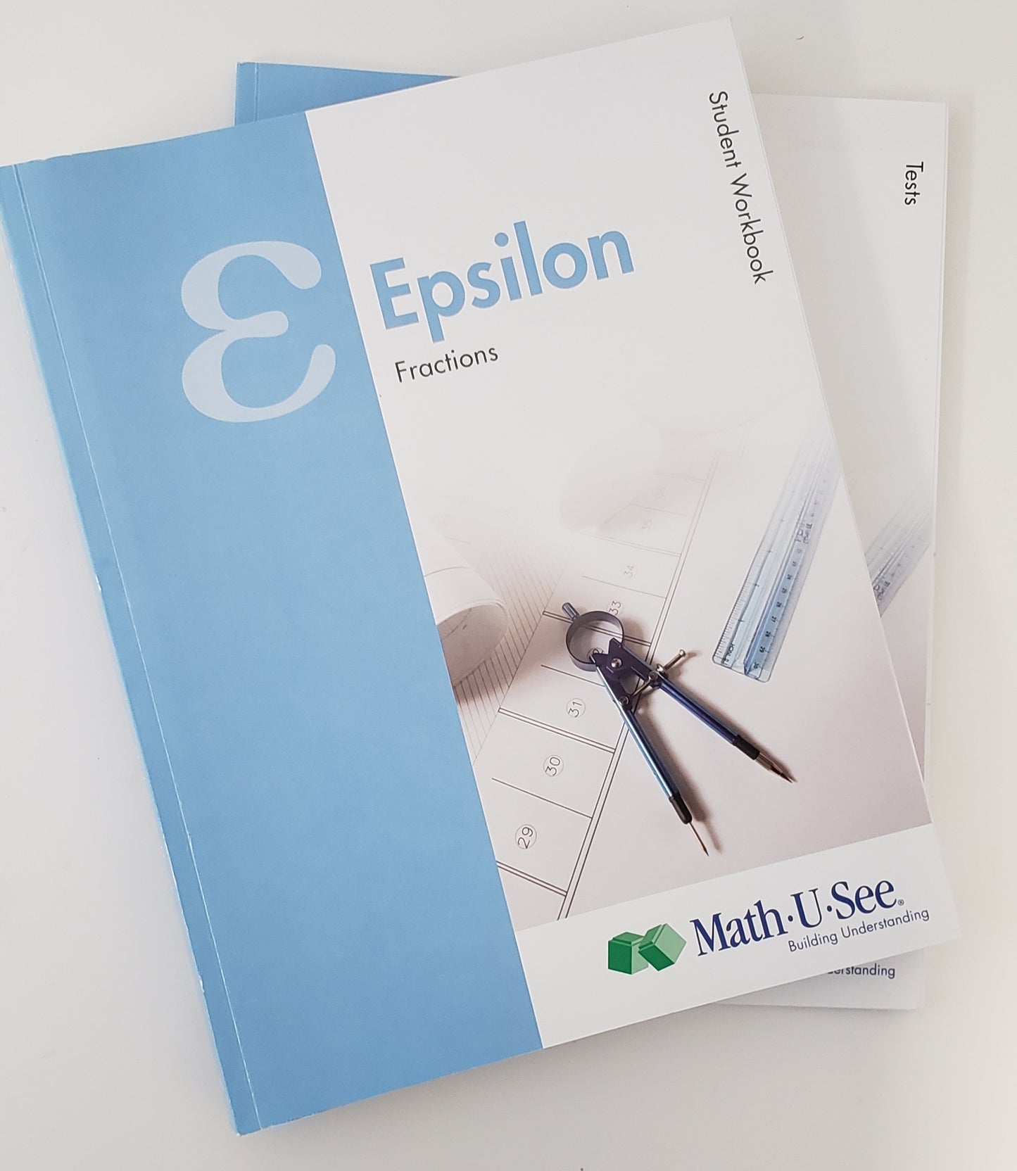 Epsilon Student Workbook and Tests
