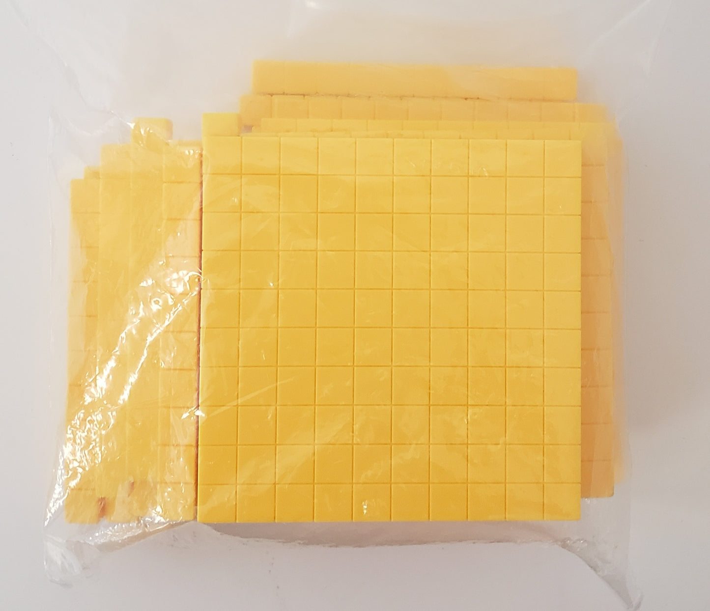 Base Ten Cubes (6 hundreds, 23 tens)